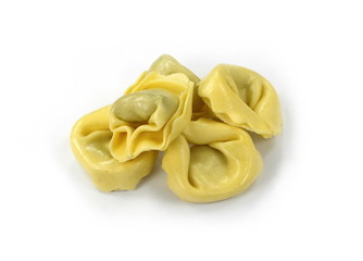 Italian traditional tortellini pasta or ravioli stuffed with spinach isolated on white background.