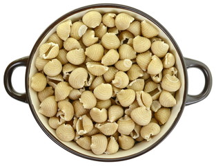 Wholemeal pasta on a white background 