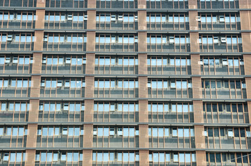 Fragment of condominium building with close up on windows, seamless pattern. 