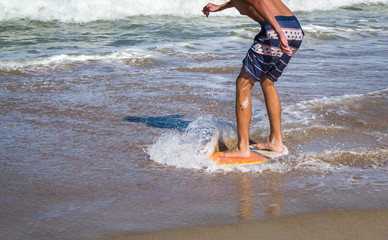 Young man on boogie board