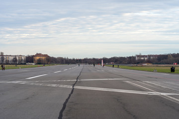 sportsman on the runway of the closed, former berlin tempelhof airport