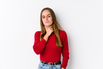 Young caucasian woman posing isolated  suffers pain in throat due a virus or infection.
