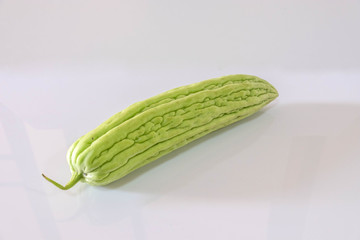 Chinese bitter melon isolated on a white background.