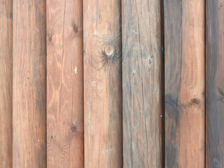 Old wooden wall. Wall of boards, geomeric pattern, vertical background.