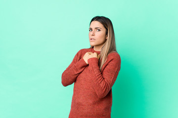 Young caucasian woman isolated scared and afraid.