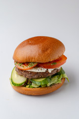 Classic american hamburger isolated on white background on a studio shot