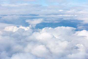 clouds and blue sky seen from plane