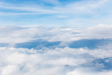 clouds and blue sky seen from plane