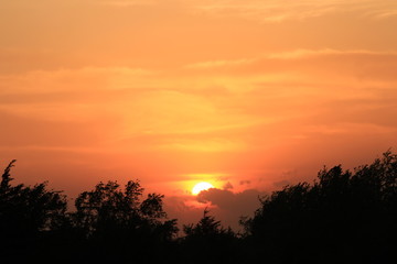 Fototapeta na wymiar Kansas colorful Sunset with a colorful sky and the Sun.