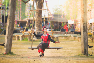 Portrait asian woman in traditional dress at Tung festival.