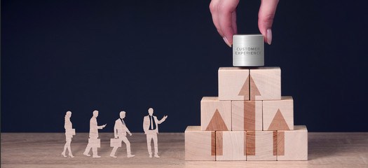 Business, Technology, Internet and network concept. Technology future. Young businessman, working on the smartphone of the future, clicks on the virtual display button: Customer Experience