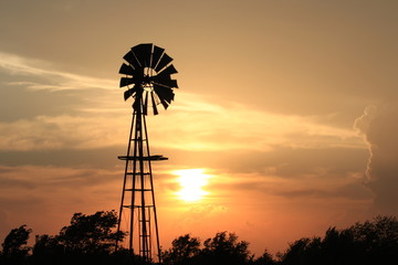 Kansas colorful Sunset with a colorful sky and Windmill silhouette