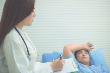 Naklejka premium Doctor examining patient obesity on light background