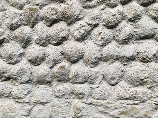 Grey stone grain bubble pattern wall spray painted textured and scratched concrete background in retro style with copy space