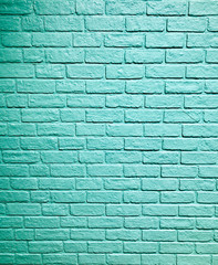 Fototapeta na wymiar Blue aqua stone brick block pattern wall spray painted texture concrete background in retro style with copy space