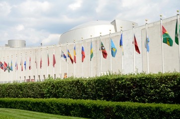 Flags from many different countries in front of the United Nations Building in New York City, United States of America