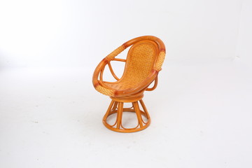 In some Asian countries and China, craftsmen use cane or wicker furniture on a white background. It...
