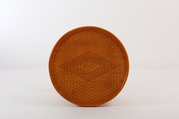 In some Asian countries and China, craftsmen use cane or wicker furniture on a white background. It...