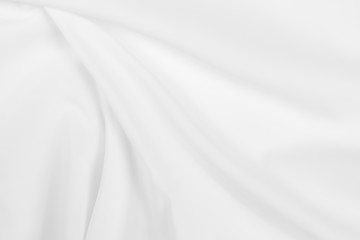 Abstract white fabric texture background. Cloth soft wave. Creases of satin, silk, and cotton.	