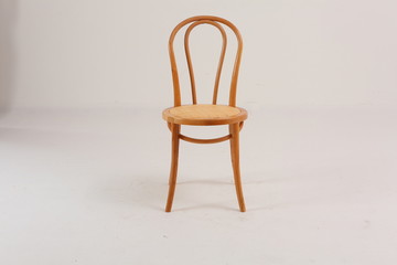 In some Asian countries and China, craftsmen use cane or wicker furniture on a white background. It...