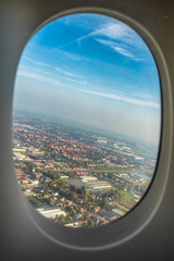 Fototapeta na wymiar Amsterdam Schiphol,, a view of an airplane window