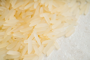 Raw rice on the kitchen table. Selective focus. shallow depth of field.