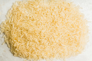Raw rice on the kitchen table. Selective focus. shallow depth of field.