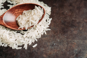 Raw rice on the kitchen table. Selective focus. shallow depth of field.