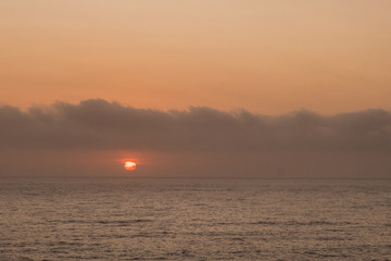 Fototapeta premium Ocean sunrise and clouds