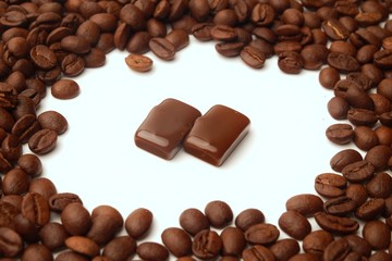 coffee candy and beans on white background