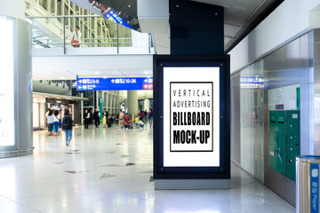 Mock up blank vertical billboard advertising in frame at airport