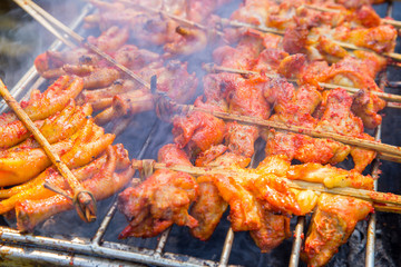 Close up of Roast or Grilled Chicken, Thai street food favorites.