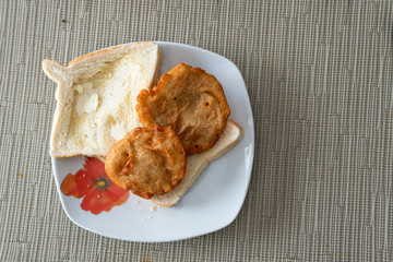 Nigerian deep fried Akara with bread and butter