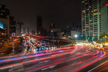 Traffic entering and exiting the Ed Koch Queensboro bridge in New York City at night