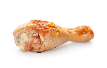 Cooked chicken drumstick on white background