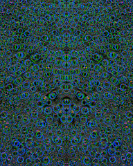 Pattern of randomly interwoven rings of different diameters and blue and green colors symmetrically...