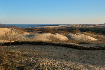 Sunset view of nordic dunes, early spring at Curonian spit, Nida, Klaipeda, Lithuania