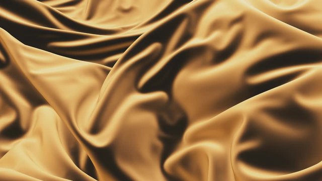 Gold silk texture of satin abstract background. Smooth soft fabric.