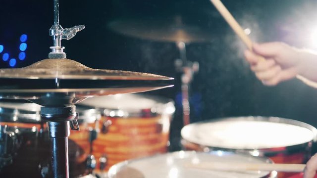 Professional drummer rehearsals in a studio.