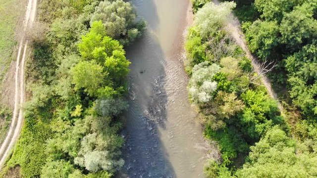 Drone Aerial Romania countryside river trees swamp green fields drones