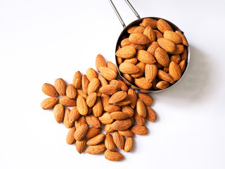 Dried almonds isolated on white background.