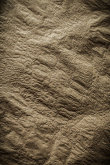 vertical general view crumpled vintage brown paper texture close up