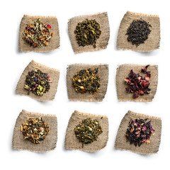 Large assortment of tea on a white background. The view from the top