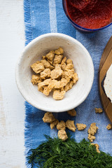 Soy meat, soya chunks, dry texturized vegan protein substitute of meat. Vegetables protein from soybeans and tomato paste. 