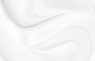 White gray satin texture that is white silver fabric silk background with beautiful soft blur pattern natural.