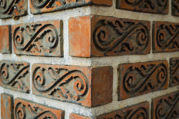 clay brick wall corner with different light