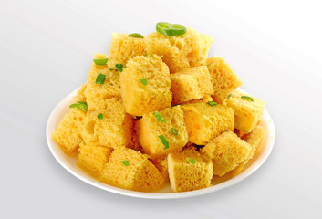 popular Indian / Gujarati dish Traditional Street Food Sev Khaman Dhokla Served With Chutney & Chilli. selective focus - Image
