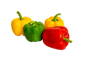 A group of raw fruit fresh yellow red and green sweet chili or bell pepper with water droplets on smooth vivid skin, organic cooking ingredient isolated on white background, die cut with clipping path