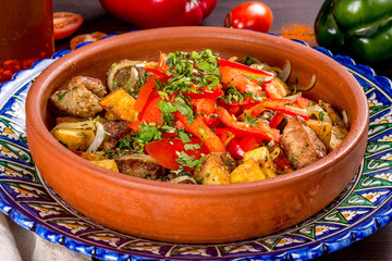 A dish of Caucasian cuisine Ojahuri shot in the decor