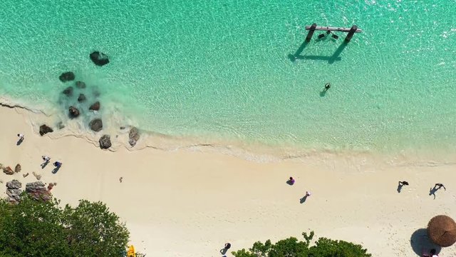 Footage B-roll of Aerial view ocean waves, beach and rocky coastline and beautiful forest. Nyaung Oo Phee Island Myanmar Tropical seas and islands in southern Myanmar. Beautiful tourist attractions.